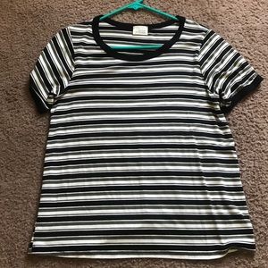 Marshall’s black, green, and white striped shirt